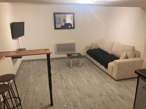 Χώρος καθιστικού στο Studio agréable et paisible