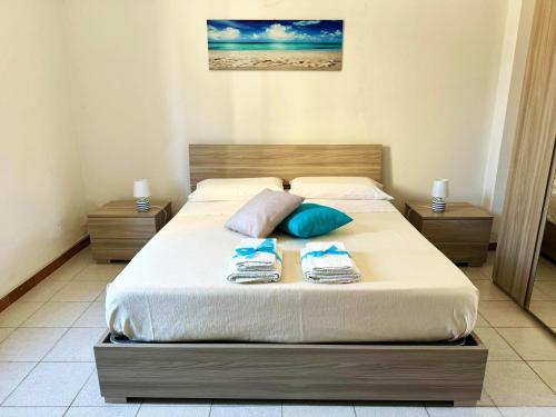 Ένα ή περισσότερα κρεβάτια σε δωμάτιο στο Il Quarzo Azzurro