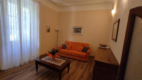Coin salon dans l'établissement Calzaioli Apartment