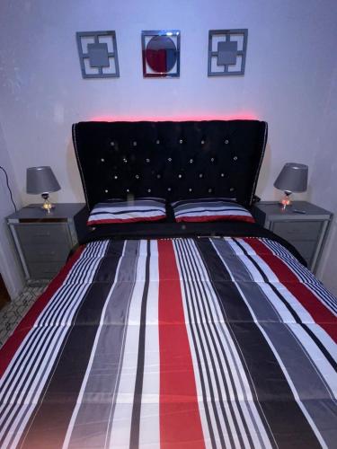 Tempat tidur dalam kamar di Juju House