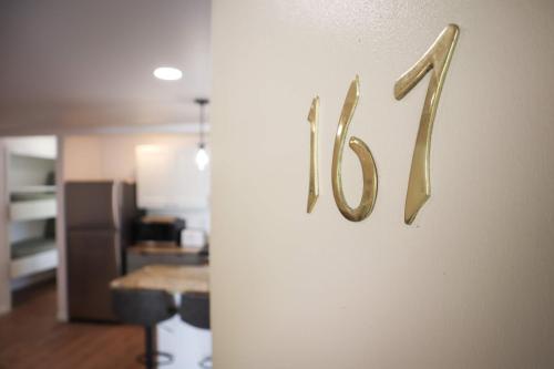 a wall with the word home written on it at Condo in Crescent Bar in Quincy