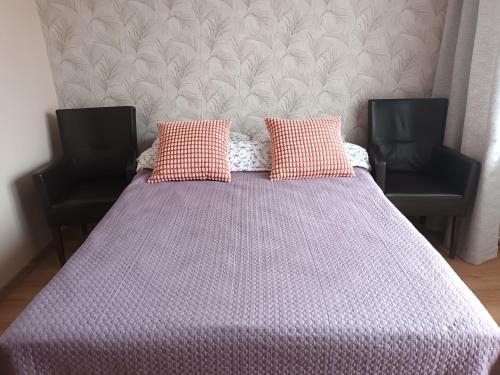 Ένα ή περισσότερα κρεβάτια σε δωμάτιο στο Apartamenty i pokoje u Kryni
