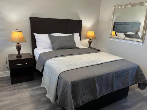 Postel nebo postele na pokoji v ubytování Miracle Motel
