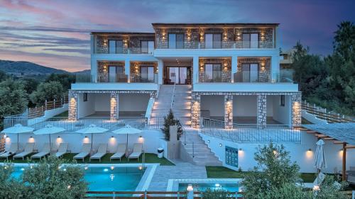 a rendering of a villa with a swimming pool at KOUROS STONE SUITES in Haraki