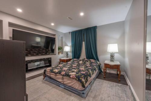 A bed or beds in a room at Nice basement apartment