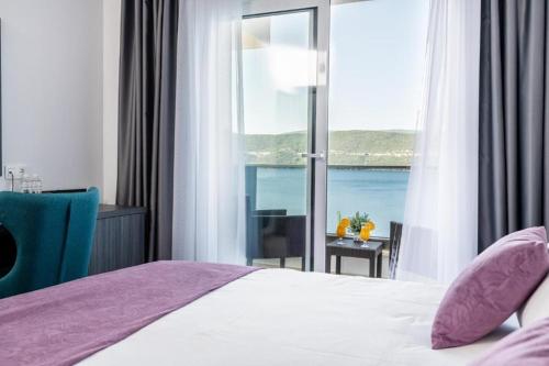Postel nebo postele na pokoji v ubytování Hotel Novum