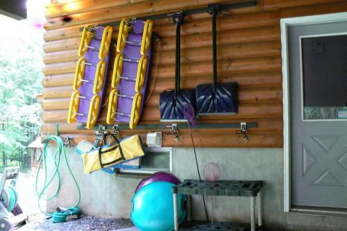 a group of bags hanging on the side of a house at Where Memories Are Made in West Kill