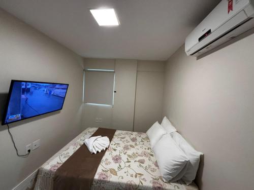 Postel nebo postele na pokoji v ubytování Apartamentos 250m da Orla -Edifício Nugali- Castelo B Temporada
