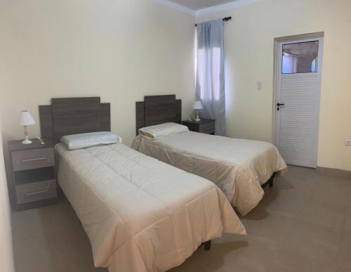 Postel nebo postele na pokoji v ubytování Hospedaje de altura