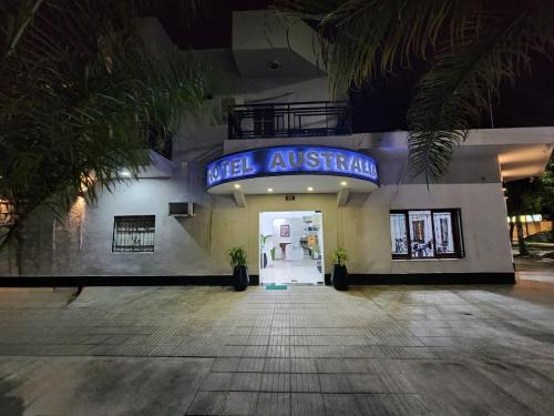 a building with a sign that reads web austrian at Hotel Australia in Termas de Río Hondo