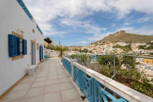 a balcony with a view of the city at HELIADES SUITES in Panteli