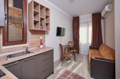 TV a/nebo společenská místnost v ubytování Bendita House