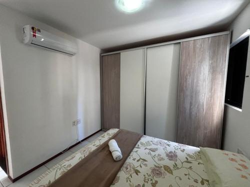 Postel nebo postele na pokoji v ubytování Apartamentos 250m da Orla -Edifício Nugali- Castelo B Temporada