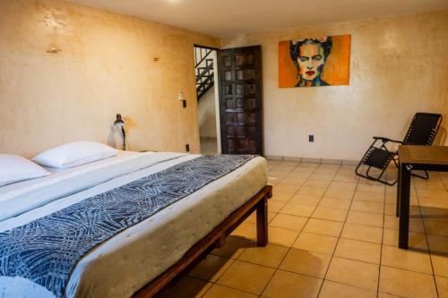 Posteľ alebo postele v izbe v ubytovaní Casa Vacacional Chukum Rio Lagartos