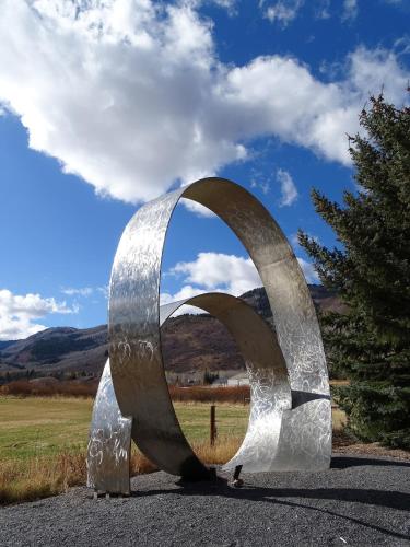 a large metal sculpture on the side of a road at Helling Circle Hideaway 303 condo in Heber City
