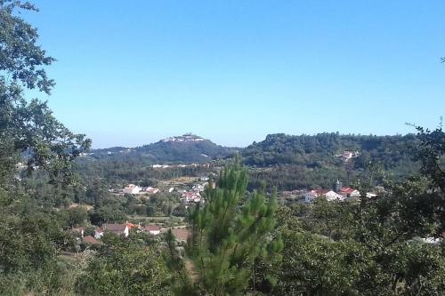 a view of a town from the hills at Fátima-Ourém - Quinta da Luz - breakfast included in Ourém