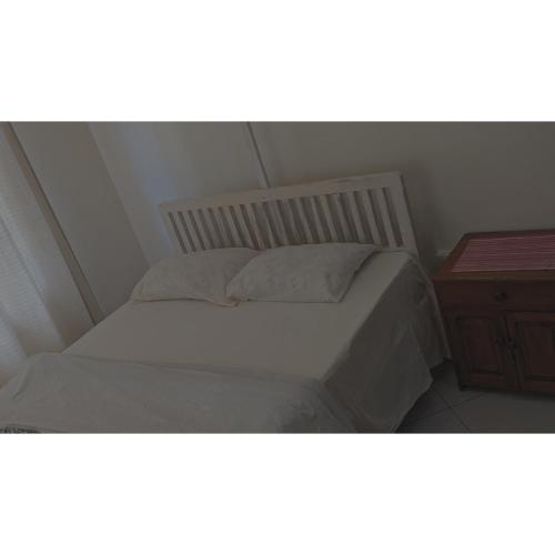 Кровать или кровати в номере JACARANDA HOMESTAY