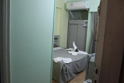 Postel nebo postele na pokoji v ubytování Emilio Hotel
