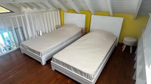 Cama o camas de una habitación en Villa Standing Accès Privé Plage