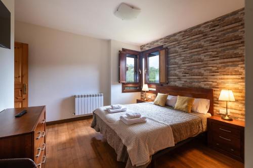 Katil atau katil-katil dalam bilik di Villa Aire de Asturias