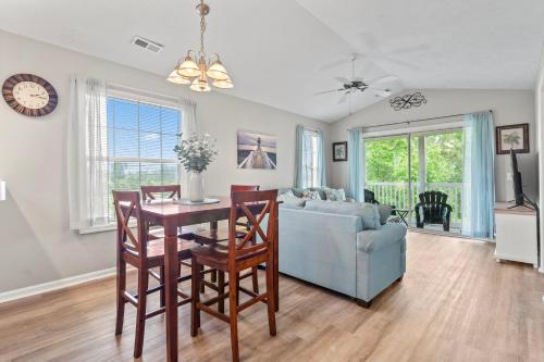 a living room with a table and a couch at Close to Beach, Ripken, Golf 2B-2B Condo in Myrtle Beach