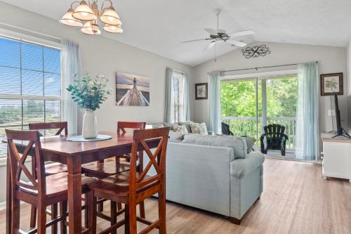 a living room with a table and a couch at Close to Beach, Ripken, Golf 2B-2B Condo in Myrtle Beach
