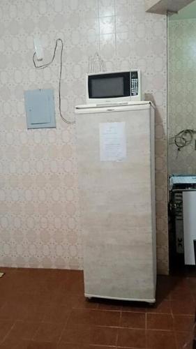 Η κουζίνα ή μικρή κουζίνα στο Apartamento no centro de Niterói com quartos exclusivos