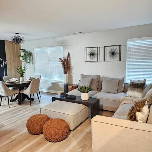 a living room with a couch and a table at Atlantic City Bungalow Retreat in Atlantic City