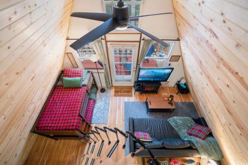 an overhead view of a living room with a ceiling at A-Frame Cabin - Mountain Views, Deck, Pet Friendly in Idaho Springs