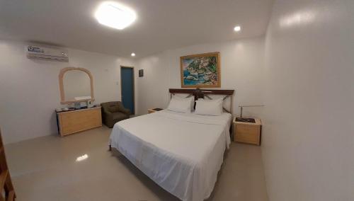 Postel nebo postele na pokoji v ubytování Tanyon Bay Beach House
