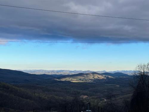 a view of the mountains from the top of a hill at Skyline Village Inn in Spruce Pine