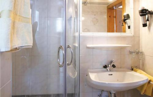 a bathroom with a shower and a sink at Beautiful Apartment In Nauders With 1 Bedrooms And Internet in Nauders