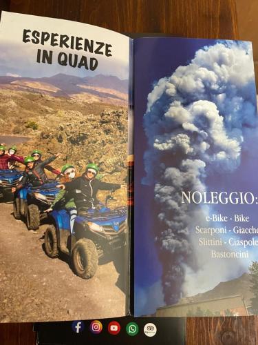 an open book with people on atvs in a eruption at Casetta sull’Etna in Nicolosi