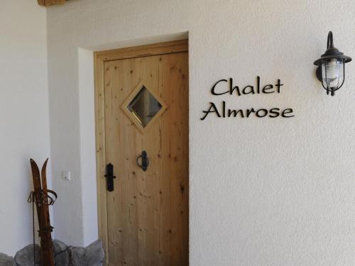 a door in a room with a sign that reads chalknance at Great chalet in an idyllic location in Wagrain in Wagrain