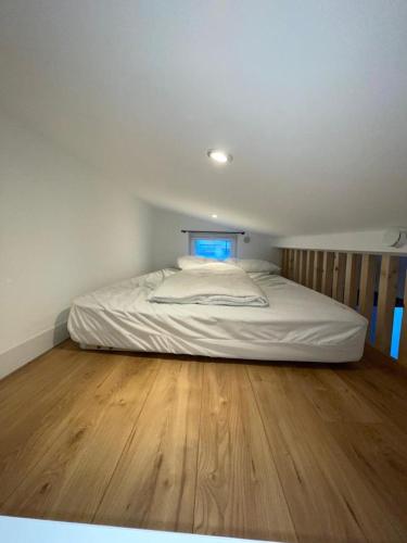 A bed or beds in a room at Appartement 3 pièces à 5 minutes de la plage