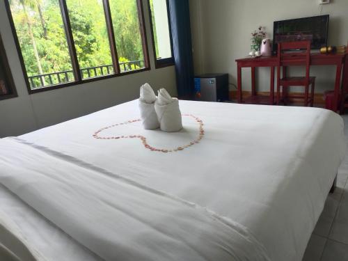 Katil atau katil-katil dalam bilik di Vang Vieng Champa Resort