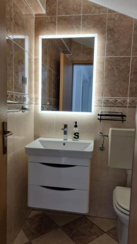 Bilik mandi di Apartmani Ritoša