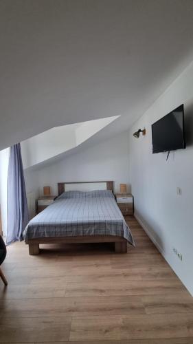 Katil atau katil-katil dalam bilik di Apartmani Ritoša