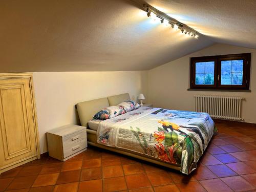 A bed or beds in a room at Villa Giovannino tra Firenze, Arezzo e Siena