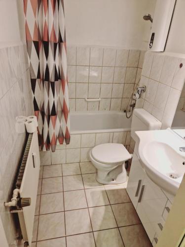 Kylpyhuone majoituspaikassa Apartment Nordtraum