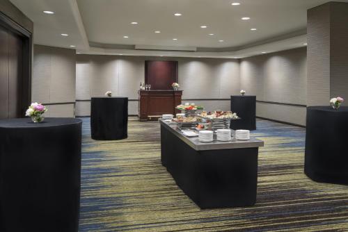 a conference room with tables with food on them at InterContinental Toronto Centre by IHG in Toronto