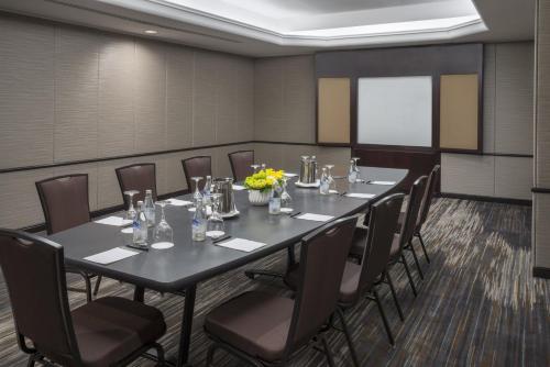 a conference room with a long table and chairs at InterContinental Toronto Centre by IHG in Toronto
