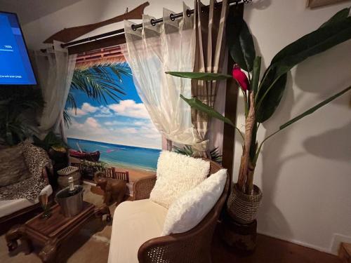 TV a/nebo společenská místnost v ubytování La Casa d'Ailleurs BERRY SEJOURS