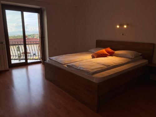 Postel nebo postele na pokoji v ubytování Apartma Domačija Bole