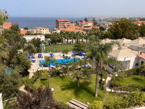 an aerial view of a resort with a swimming pool at Hotel Rais in El Marsa
