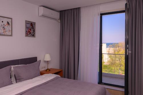 Ένα ή περισσότερα κρεβάτια σε δωμάτιο στο Luxury TES Apartment