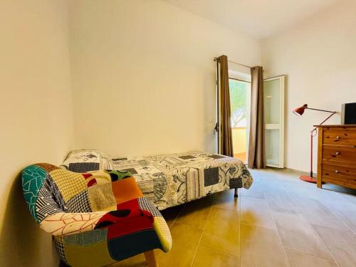 Ein Bett oder Betten in einem Zimmer der Unterkunft Villa Oltremare