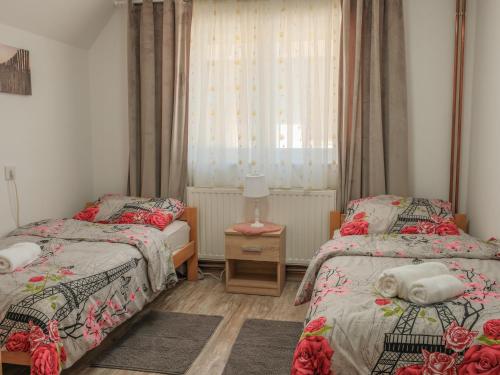 Ένα ή περισσότερα κρεβάτια σε δωμάτιο στο Apartman Marin