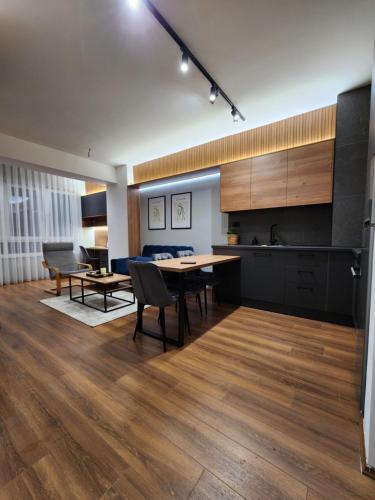 Kuchyň nebo kuchyňský kout v ubytování District Apartment