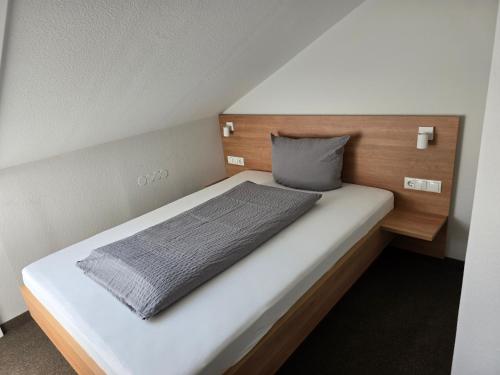 Katil atau katil-katil dalam bilik di Hotel Landgasthof Blume